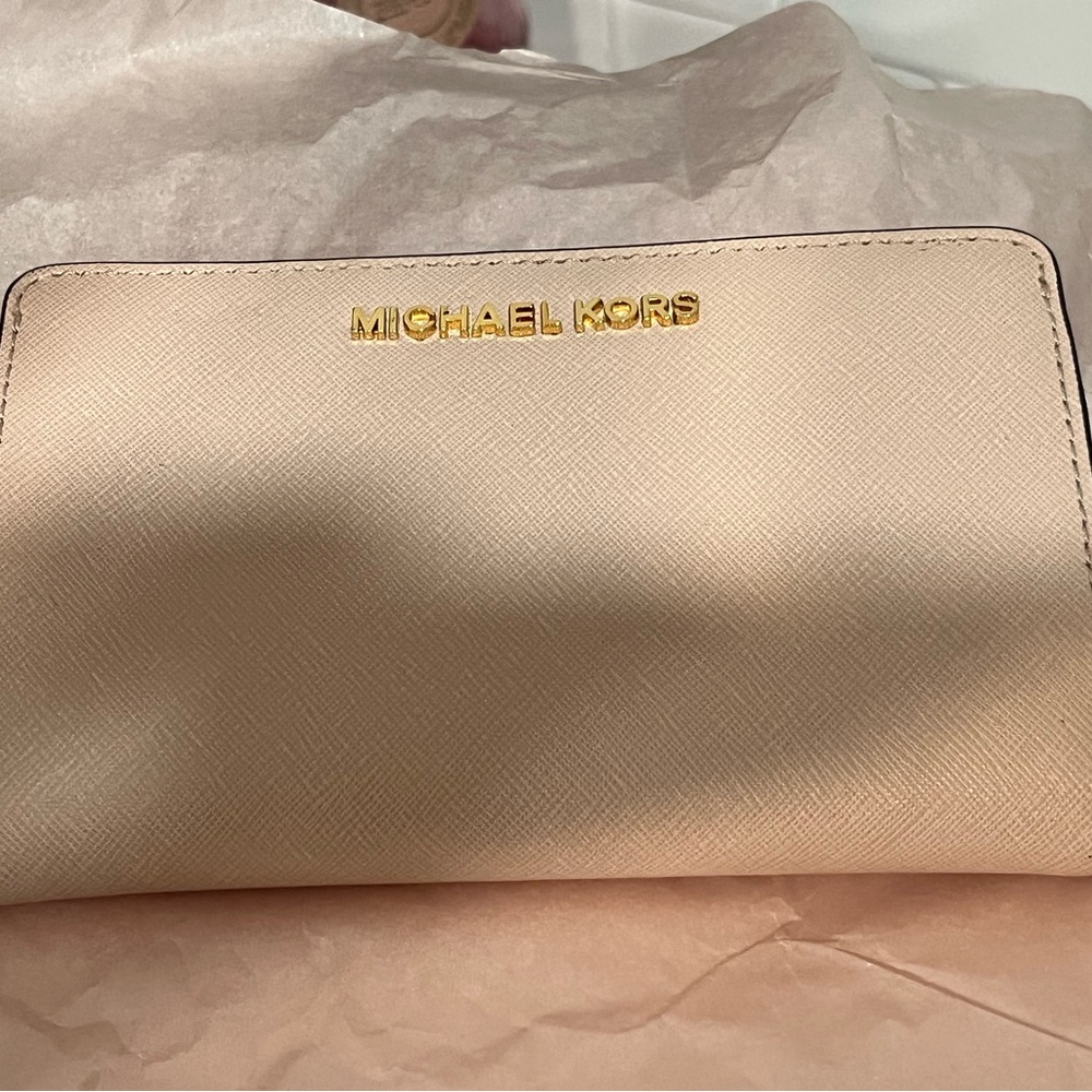 Micheal Kors light peach wallet